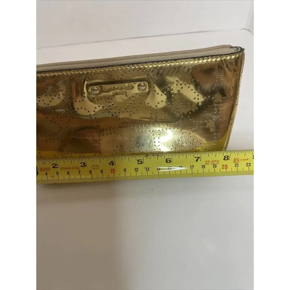 - KATE SPADE New York LITTLE SHILOH Metro Spade Gold Shimmer cosmetic bag